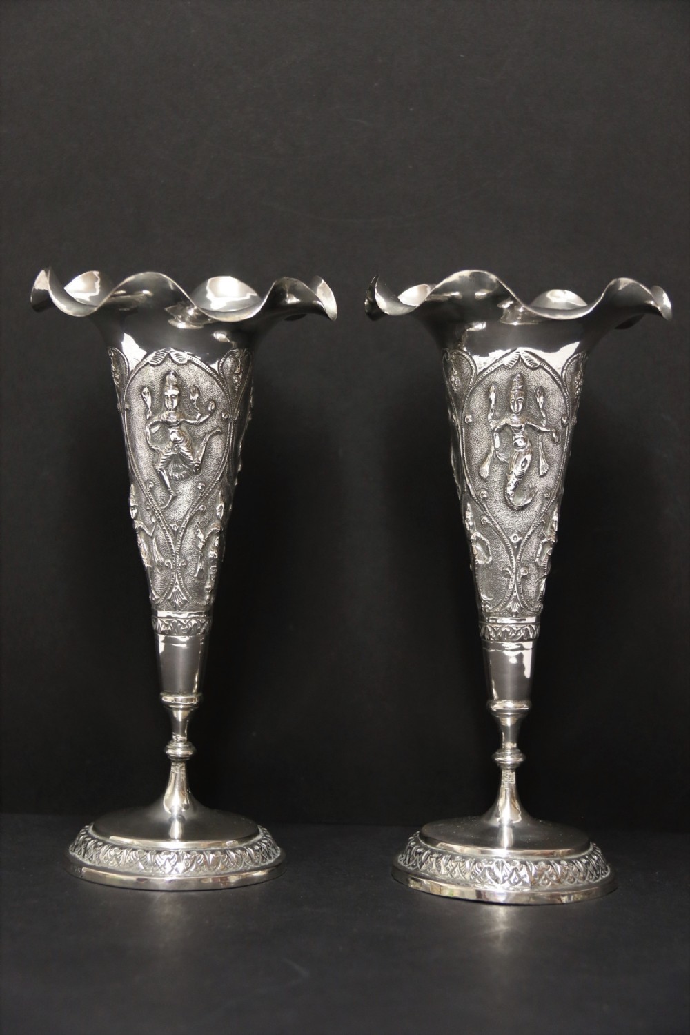 A fine pair of 19th century Raj Period Indian silver vases