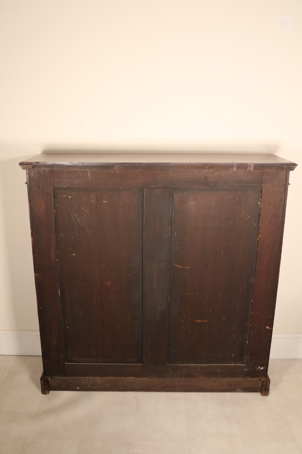 An Edwardian mahogany bookcase with open fully adjustable shelves View X