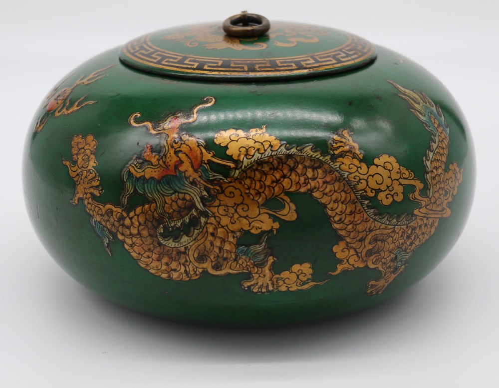A decorative Chinese papier mache lacquered and hand painted lidded pot 

