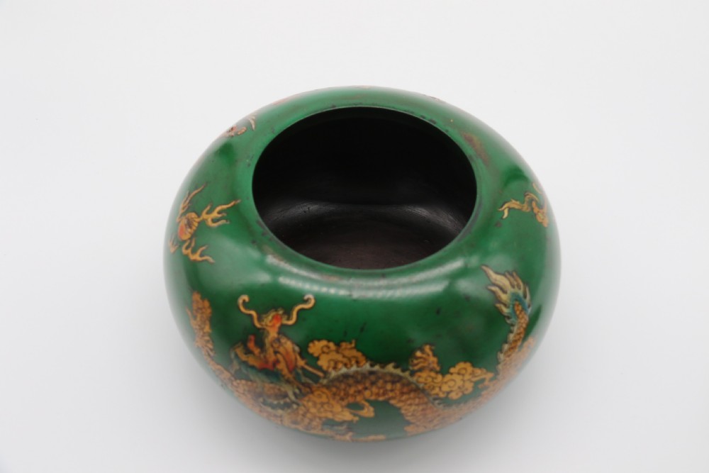 A decorative Chinese papier mache lacquered and hand painted lidded pot 

 View X