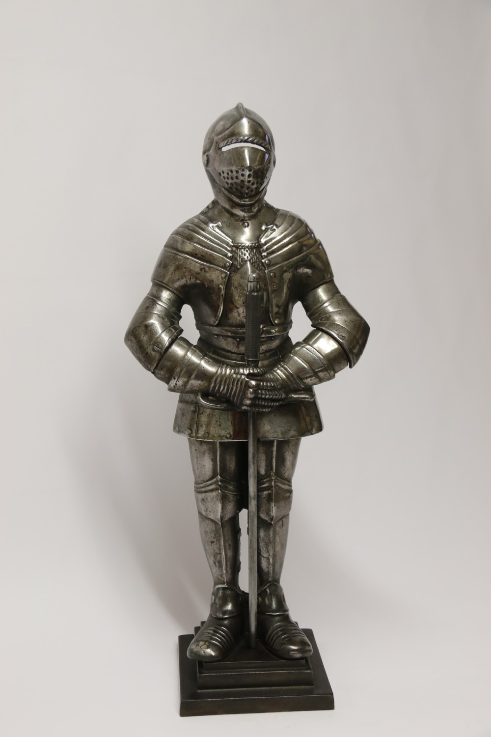 An impressive fire side poker stand in the form of a medieval knight View IV
