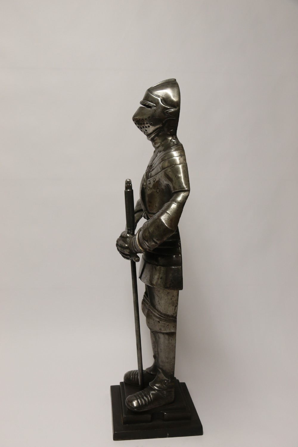 An impressive fire side poker stand in the form of a medieval knight View VIII