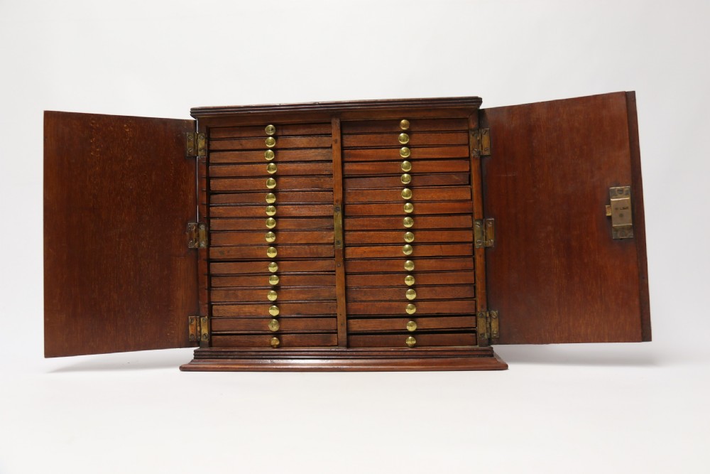 A rare Victorian mahogany 32 drawer coin collectors cabinet View II