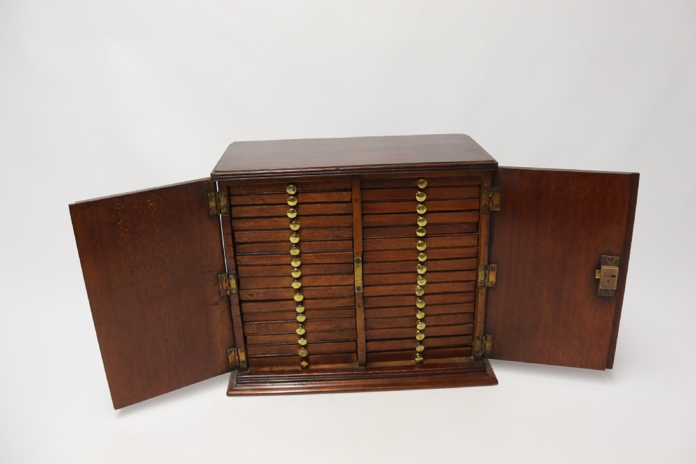 A rare Victorian mahogany 32 drawer coin collectors cabinet View III
