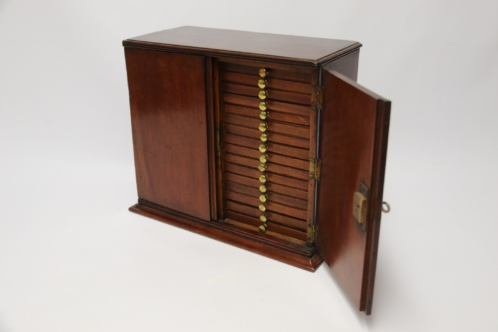 A rare Victorian mahogany 32 drawer coin collectors cabinet View V