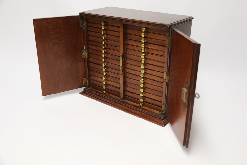 A rare Victorian mahogany 32 drawer coin collectors cabinet View VI