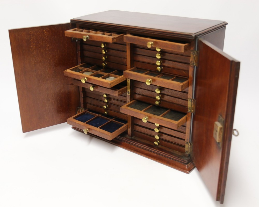 A rare Victorian mahogany 32 drawer coin collectors cabinet View VII