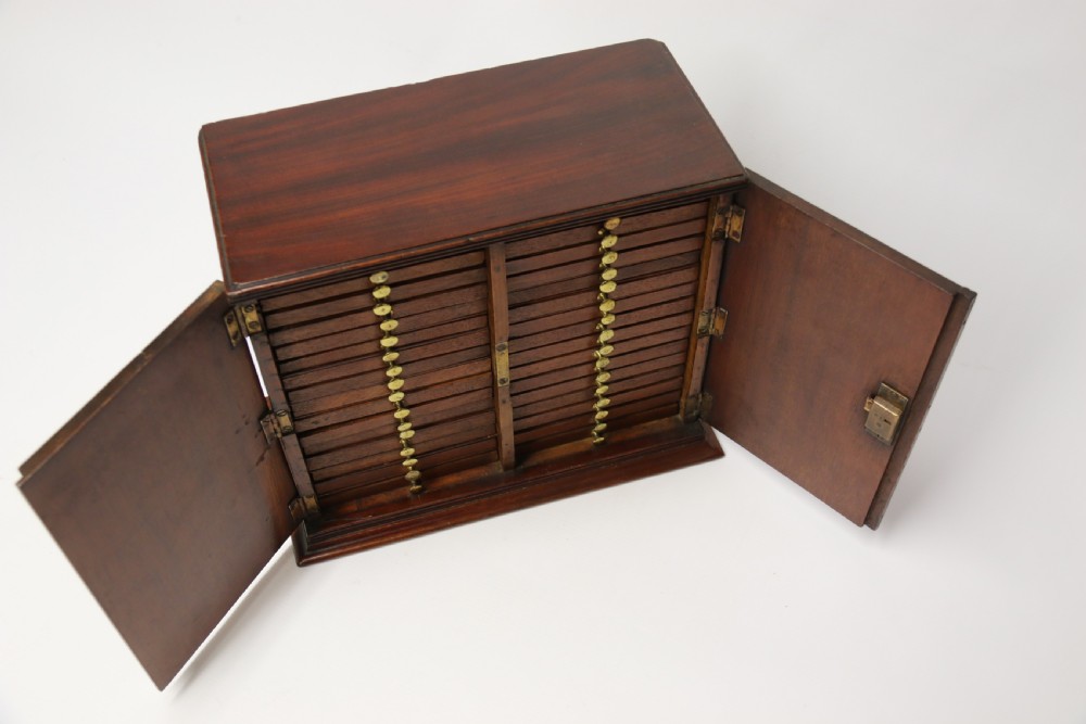 A rare Victorian mahogany 32 drawer coin collectors cabinet View XV