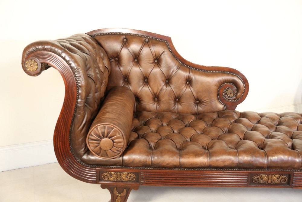 A splendid Regency mahogany and brass mounted deep buttoned leather upholstered chaise lounge View XI