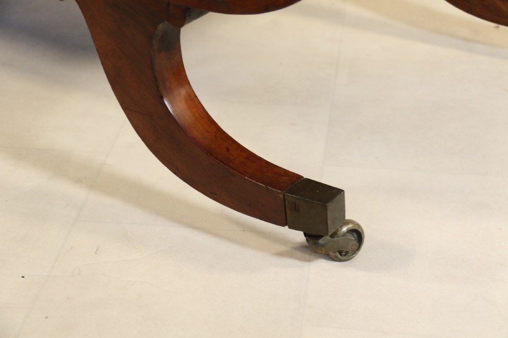 A splendid Regency mahogany and brass mounted deep buttoned leather upholstered chaise lounge View XVIII