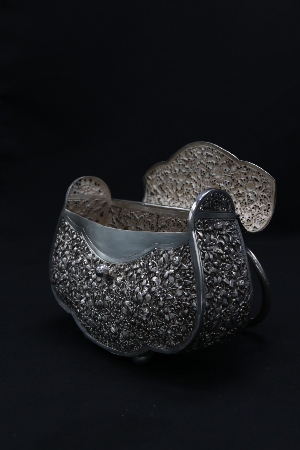 A decorative Chinese hand decorated copper and silver plated handbag, circa 1910  View VI