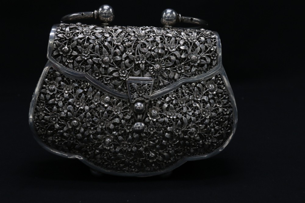 A decorative Chinese hand decorated copper and silver plated handbag, circa 1910  View X