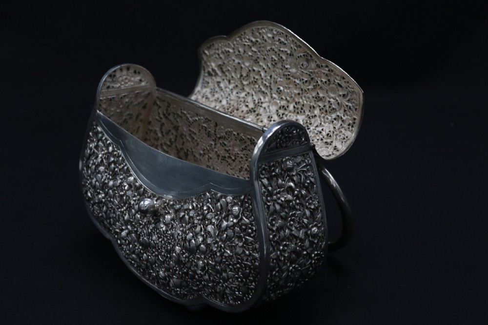 A decorative Chinese hand decorated copper and silver plated handbag, circa 1910  View XII