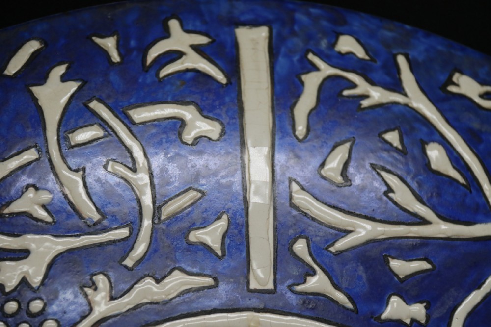 A bold impressive hand painted Continental pottery plaque with a central portrait of Rubens View XI