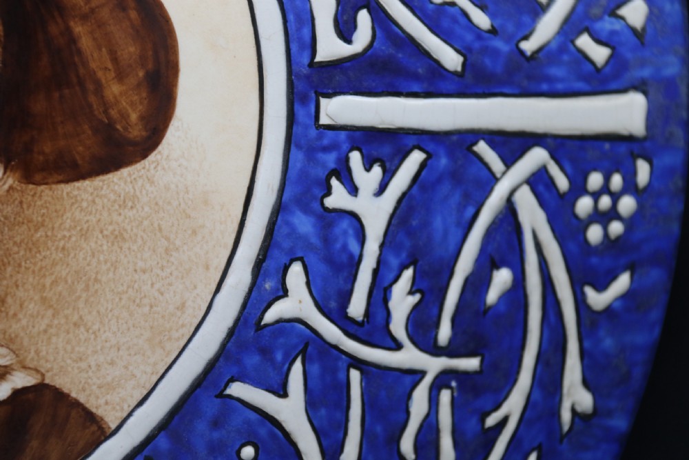 A bold impressive hand painted Continental pottery plaque with a central portrait of Rubens View XIII