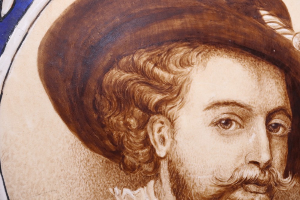 A bold impressive hand painted Continental pottery plaque with a central portrait of Rubens View XV