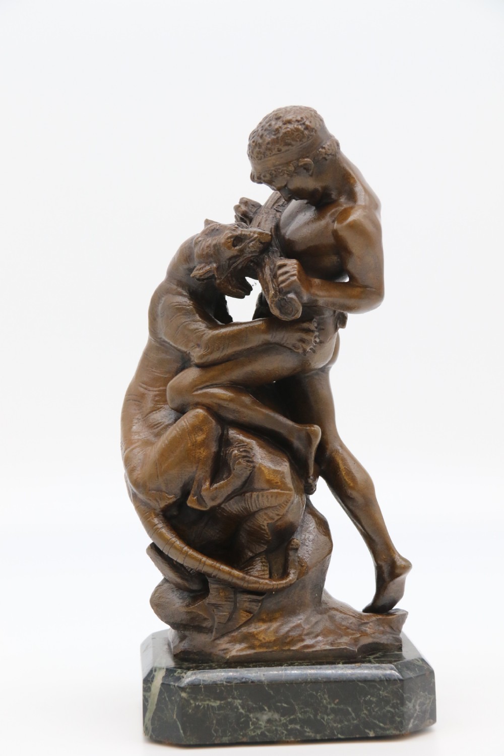 A fine late 19th century classical bronze study of a man fighting a tiger
By Edouard Drouot

