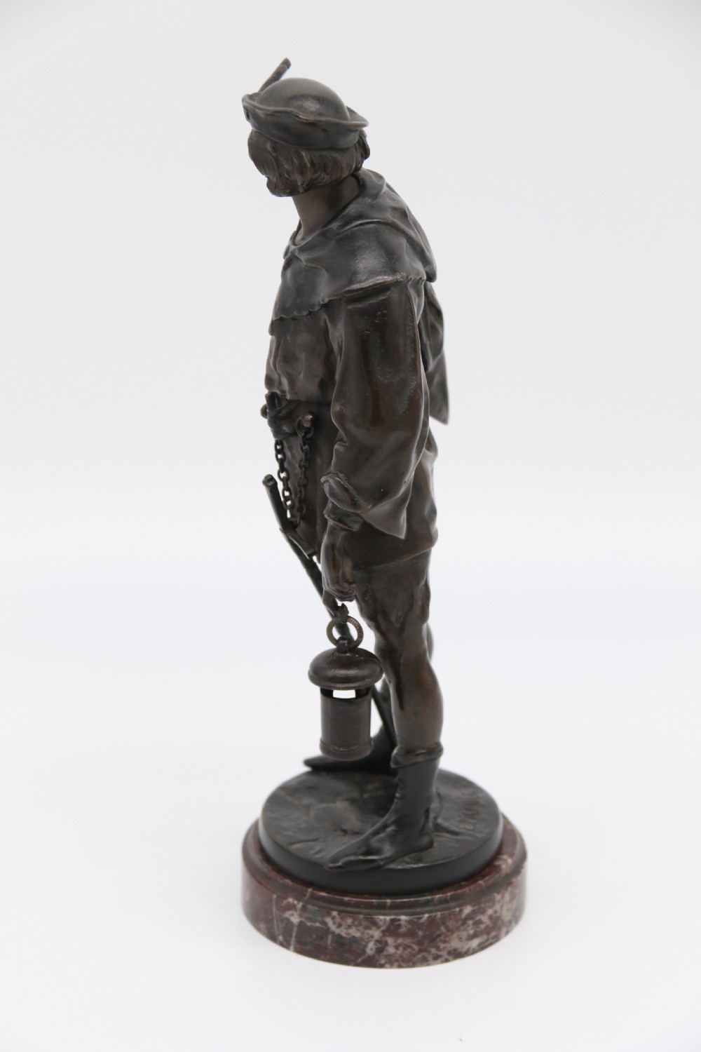 A fine bronze study of a medieval young man by Emile Picault. View IV