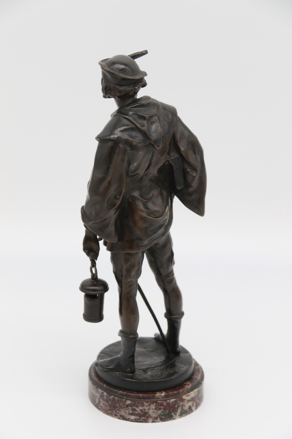 A fine bronze study of a medieval young man by Emile Picault. View V