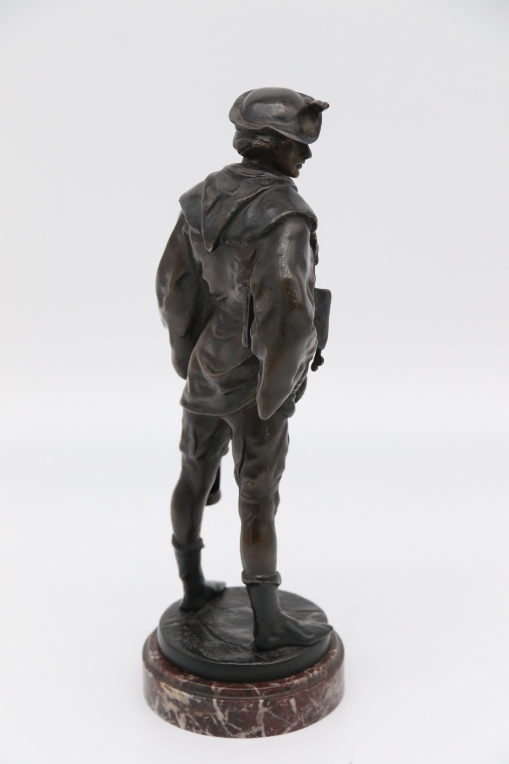 A fine bronze study of a medieval young man by Emile Picault. View VII