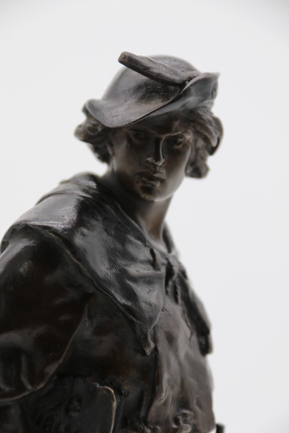 A fine bronze study of a medieval young man by Emile Picault. View XV