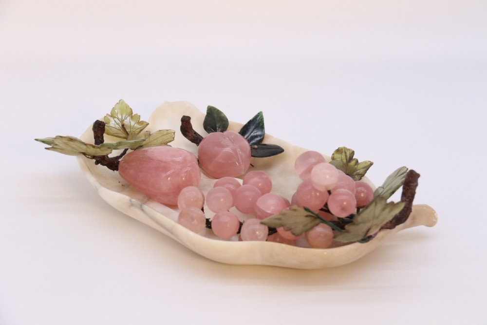 A Chinese hardstone collection of fruit together with a carved alabaster leaf dish View VII