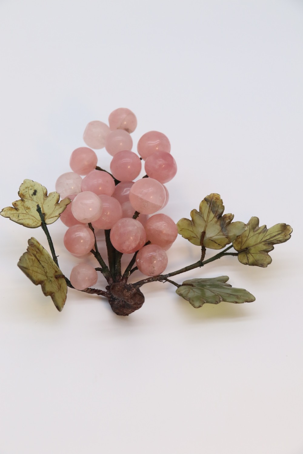 A Chinese hardstone collection of fruit together with a carved alabaster leaf dish View IX