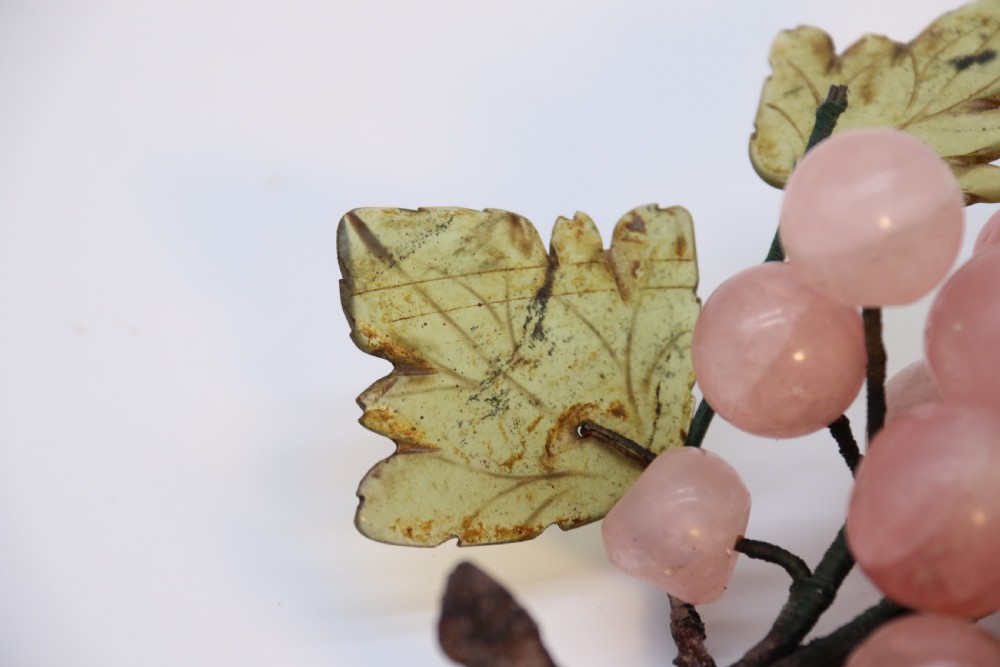 A Chinese hardstone collection of fruit together with a carved alabaster leaf dish View XI