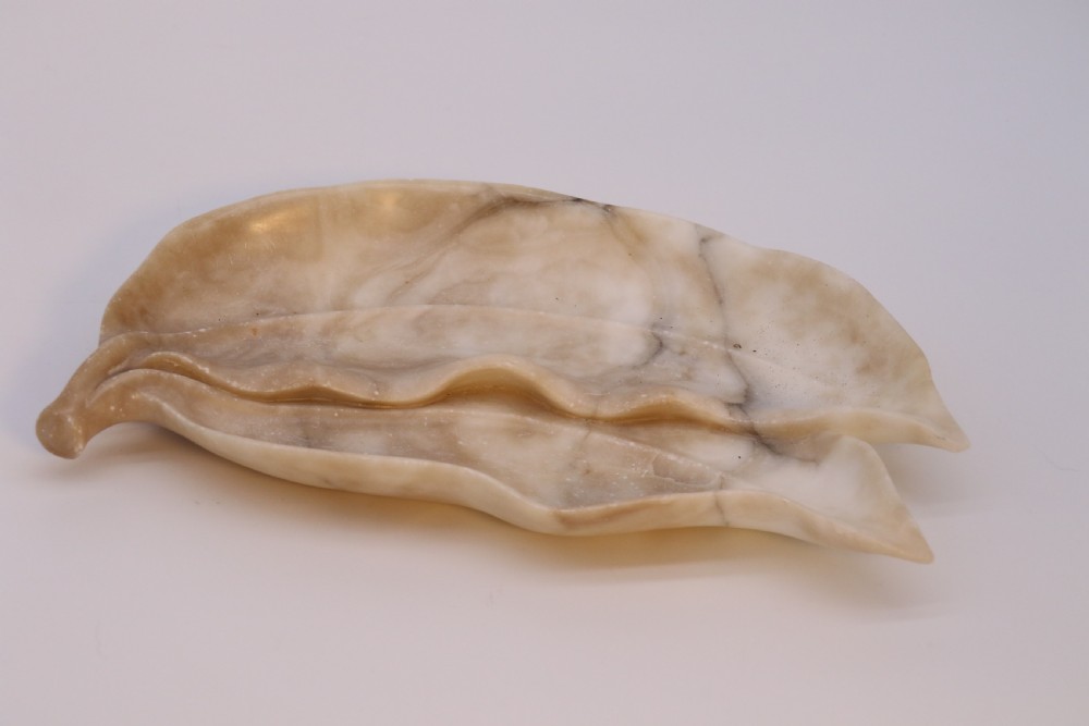 A Chinese hardstone collection of fruit together with a carved alabaster leaf dish View XVII