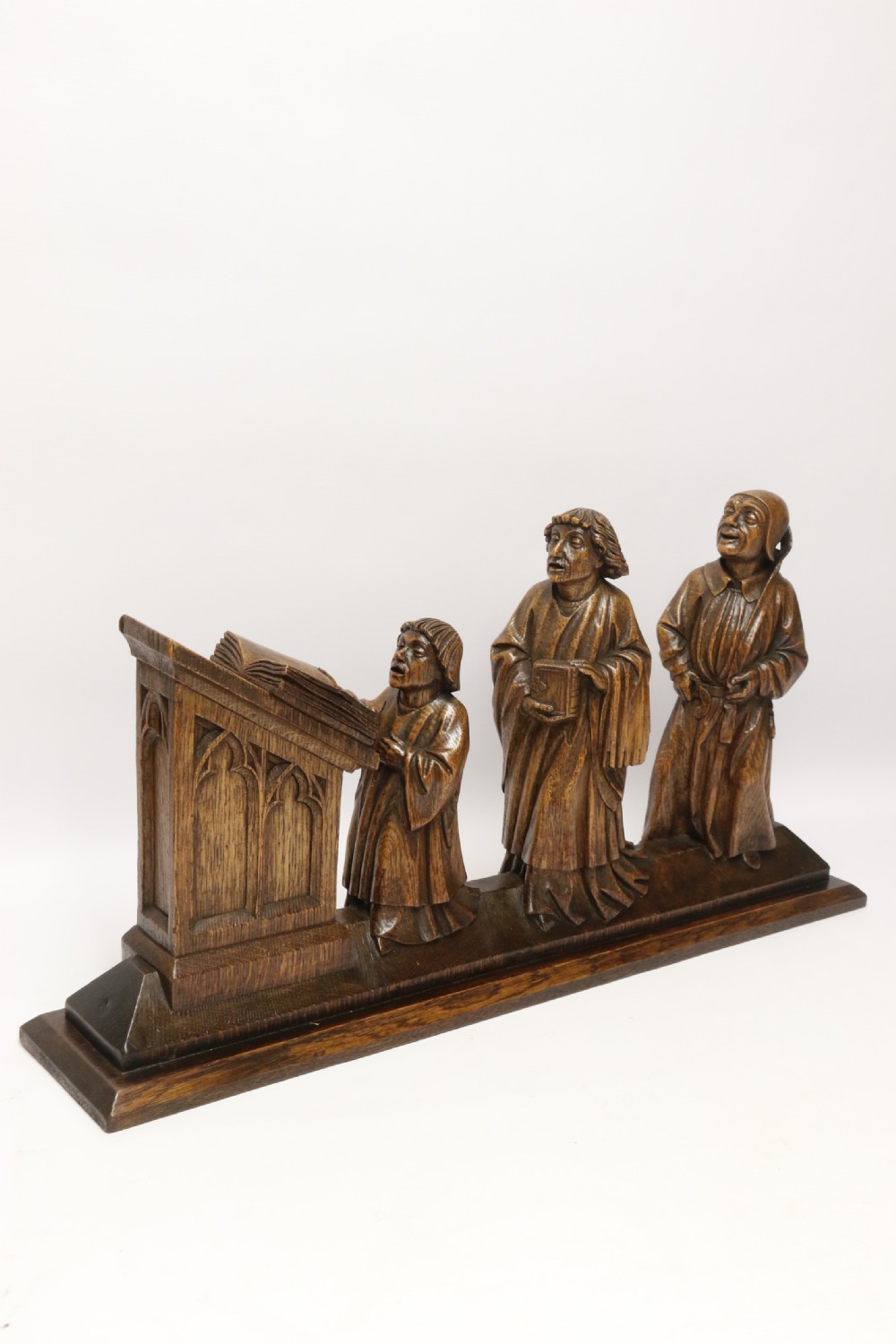 A Fine 19th century Arts and Crafts carved oak figure group of three monks. View III