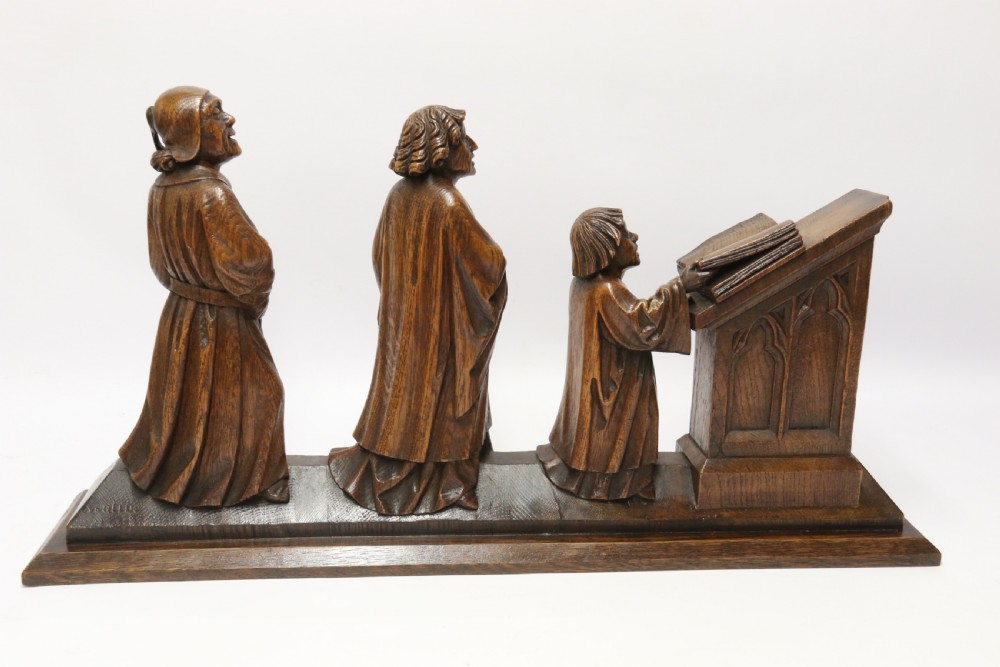 A Fine 19th century Arts and Crafts carved oak figure group of three monks. View IV