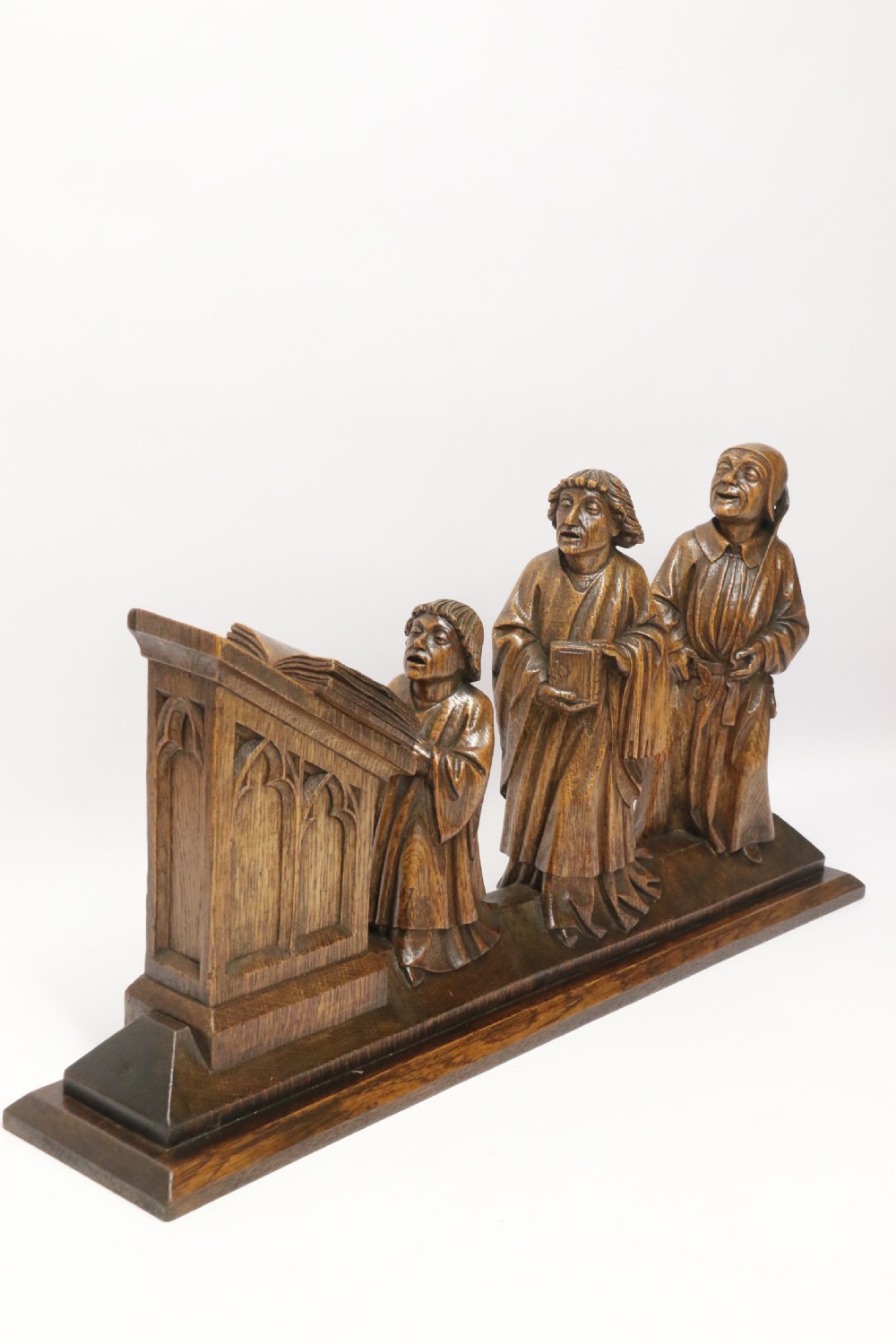 A Fine 19th century Arts and Crafts carved oak figure group of three monks. View VII
