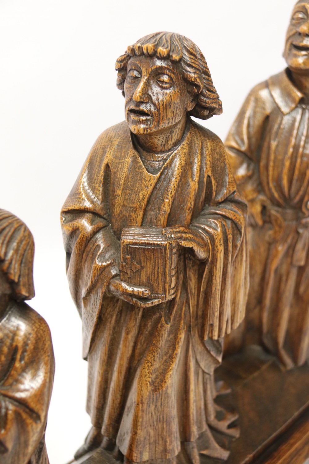 A Fine 19th century Arts and Crafts carved oak figure group of three monks. View IX