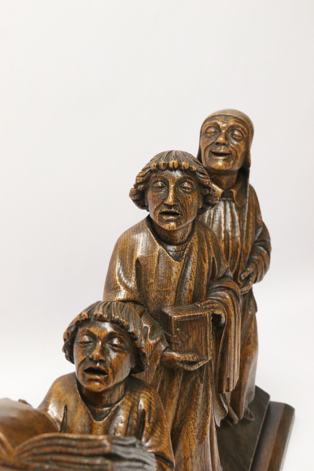 A Fine 19th century Arts and Crafts carved oak figure group of three monks. View XV
