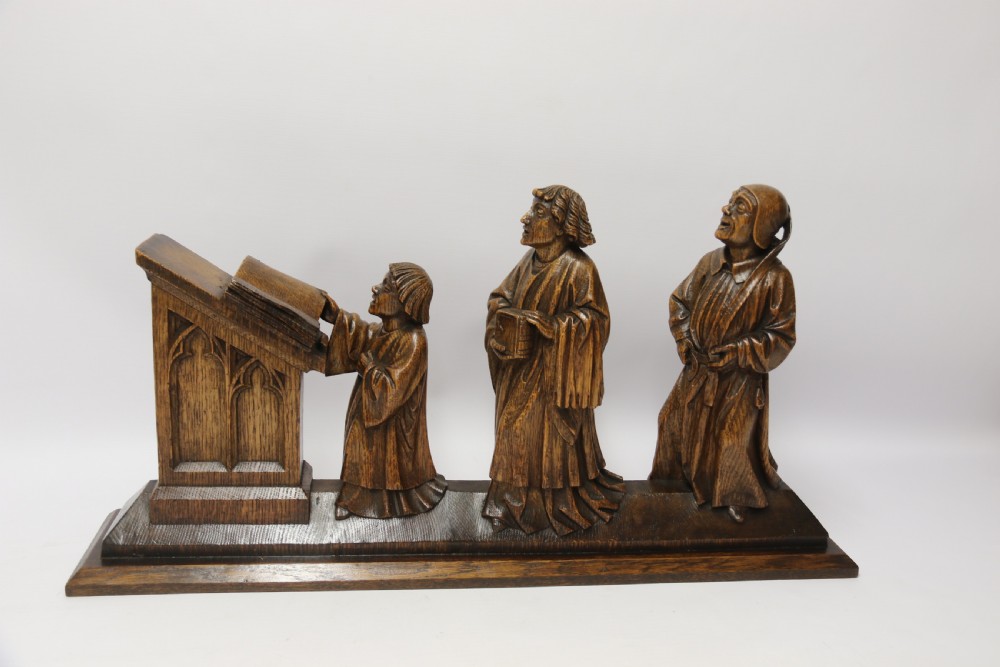 A Fine 19th century Arts and Crafts carved oak figure group of three monks. View XXI