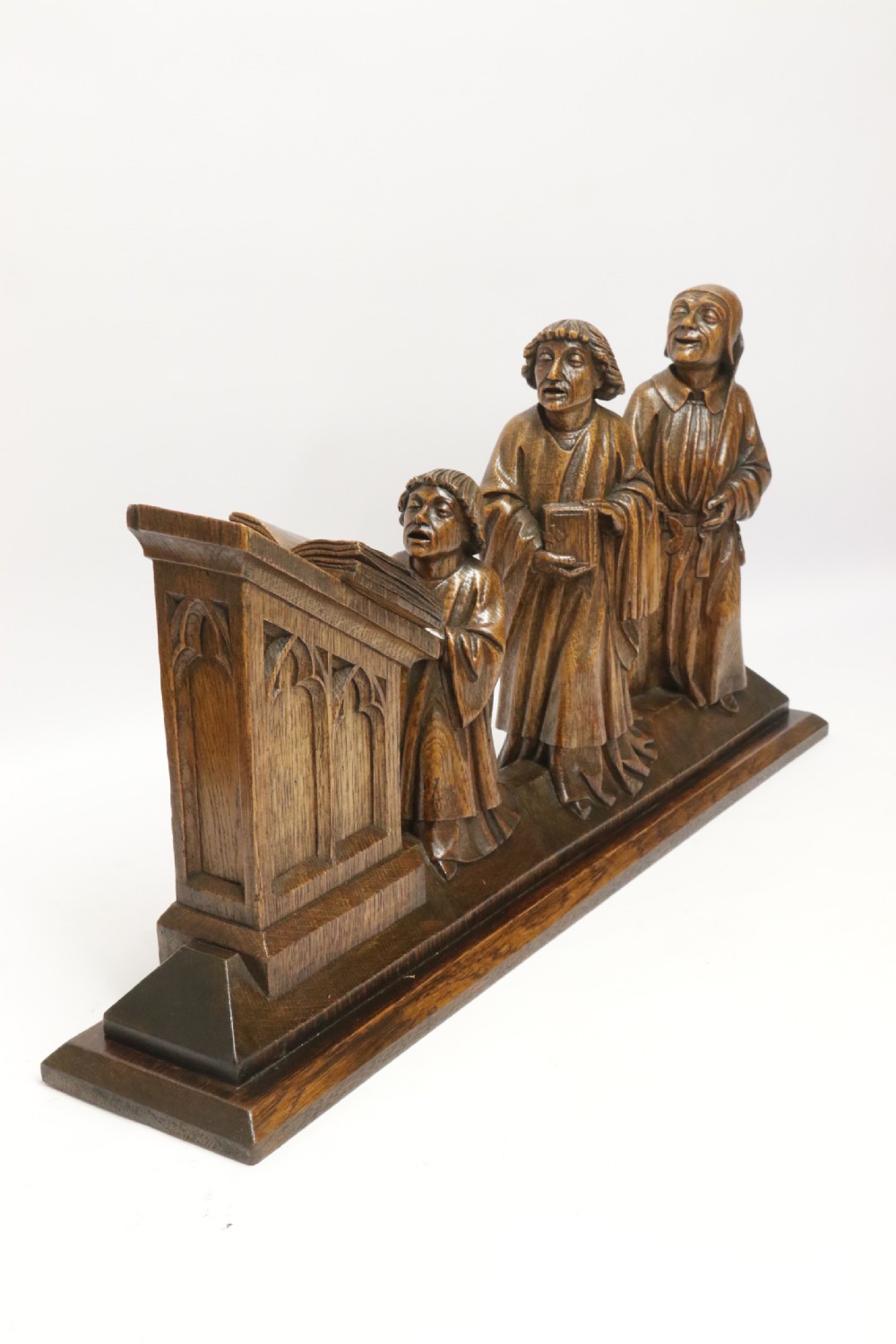 A Fine 19th century Arts and Crafts carved oak figure group of three monks. View XXII