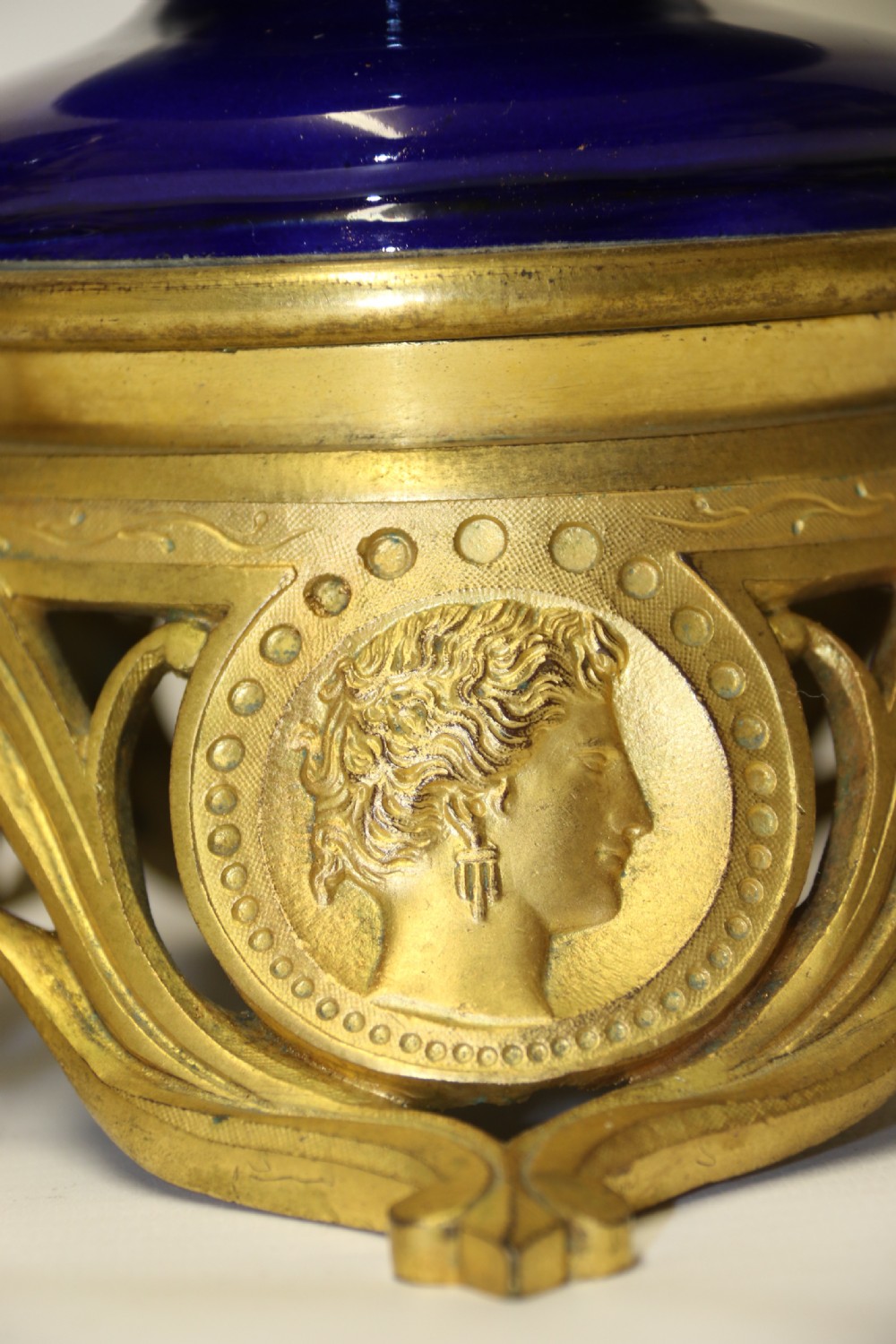 A superb pair of gilt bronze and pottery Aztec design vases/ urns View IV