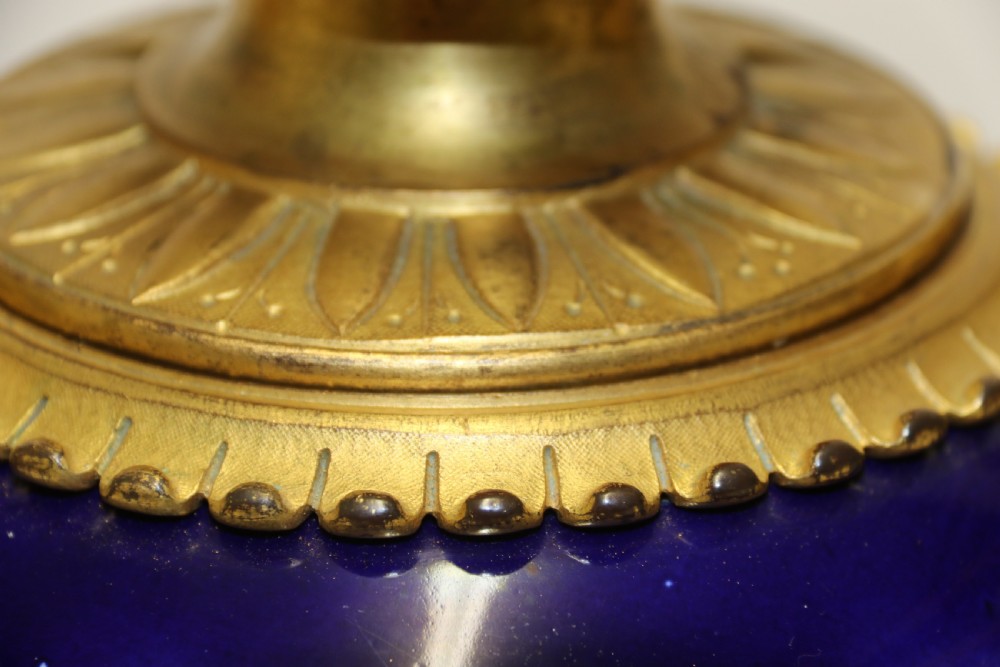 A superb pair of gilt bronze and pottery Aztec design vases/ urns View V
