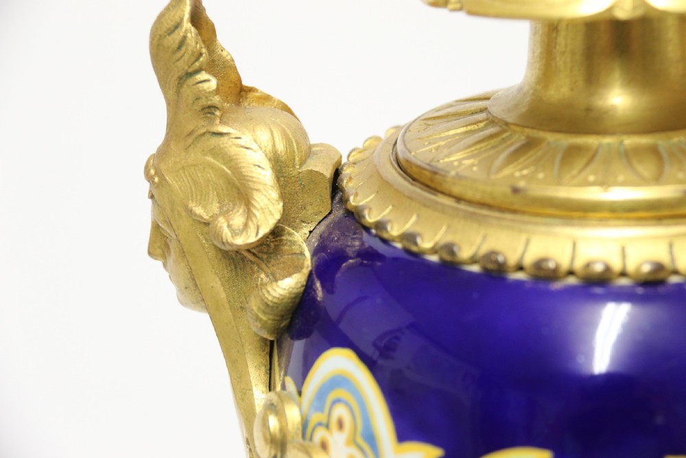 A superb pair of gilt bronze and pottery Aztec design vases/ urns View VIII