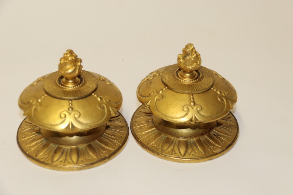 A superb pair of gilt bronze and pottery Aztec design vases/ urns View IX