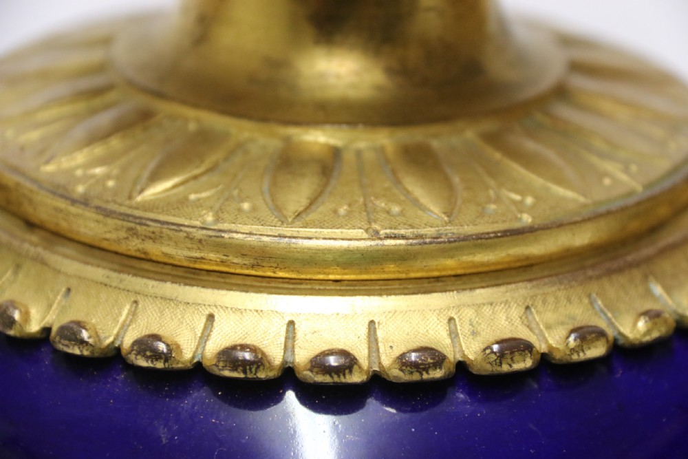 A superb pair of gilt bronze and pottery Aztec design vases/ urns View XI