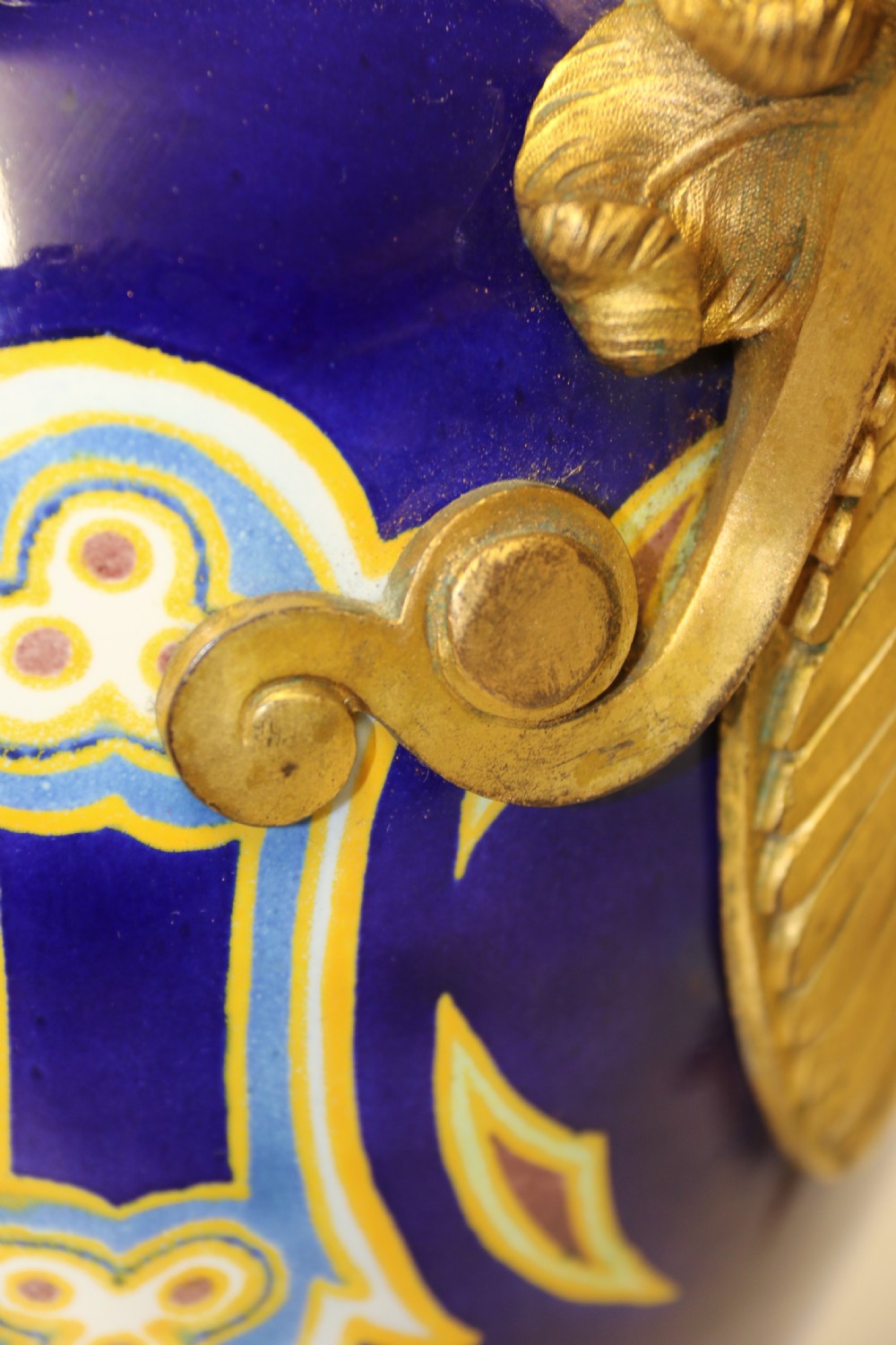 A superb pair of gilt bronze and pottery Aztec design vases/ urns View XVI