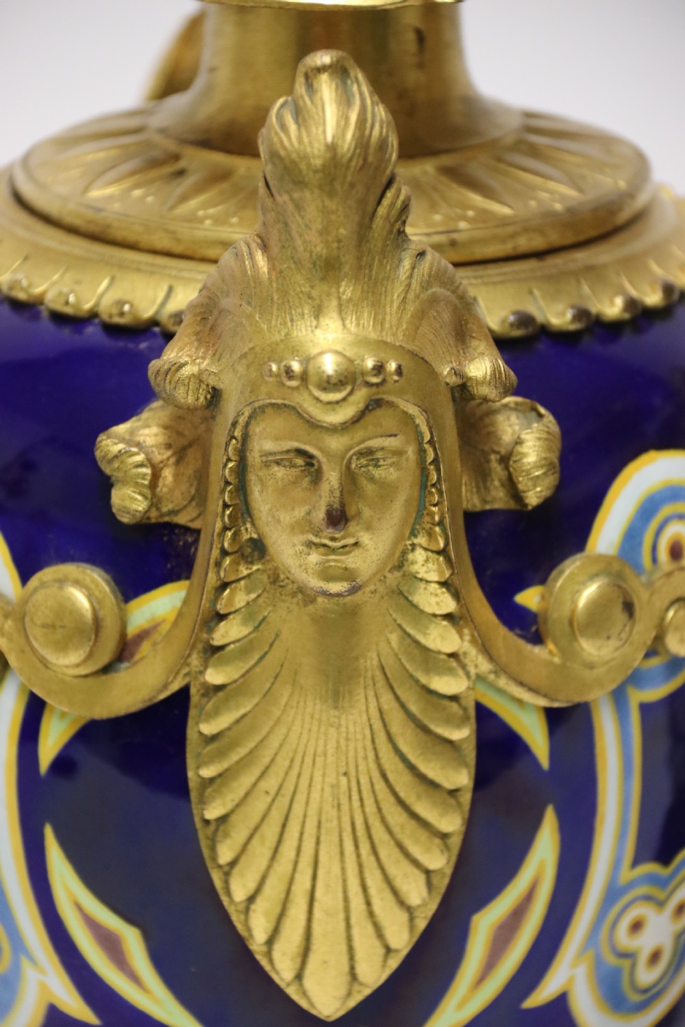 A superb pair of gilt bronze and pottery Aztec design vases/ urns View XX