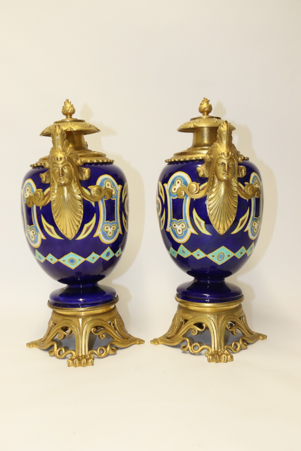 A superb pair of gilt bronze and pottery Aztec design vases/ urns View XXIII