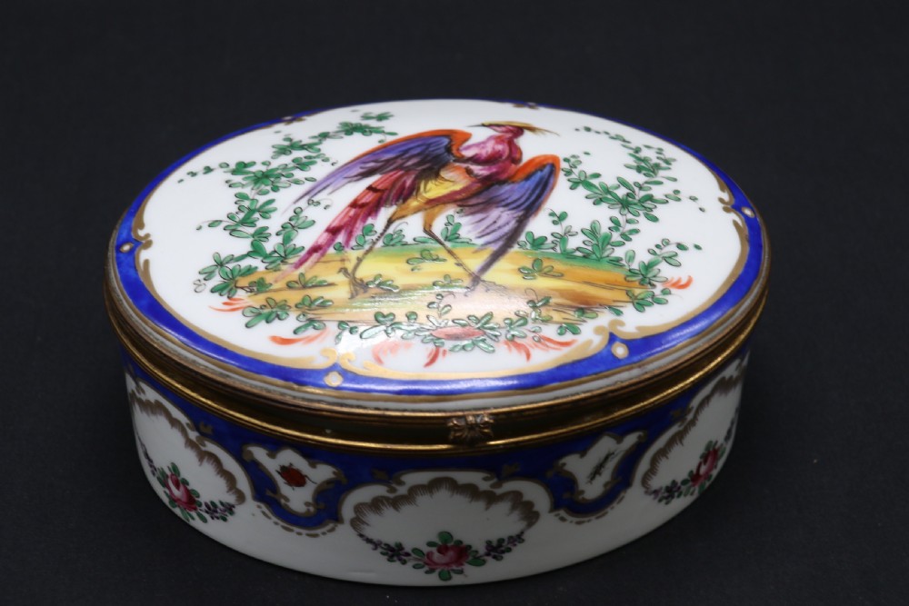 A late 19th century French hand painted porcelain oval box by Samson of Paris View II
