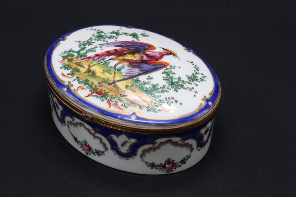A late 19th century French hand painted porcelain oval box by Samson of Paris View IV