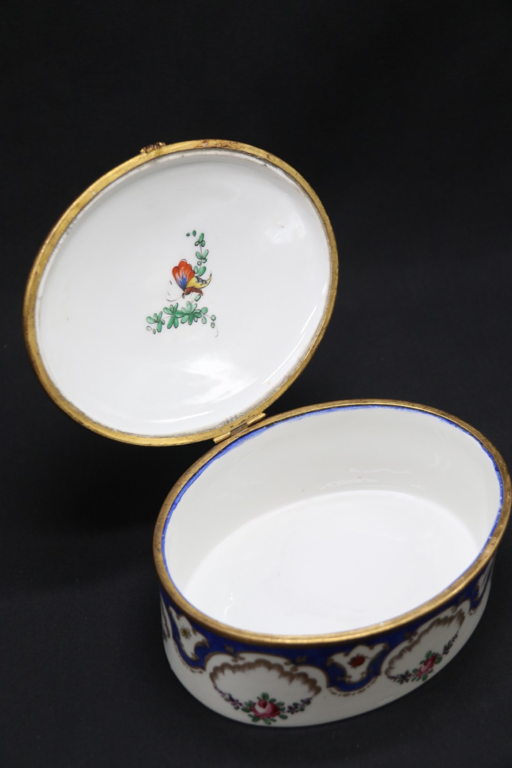 A late 19th century French hand painted porcelain oval box by Samson of Paris View VI