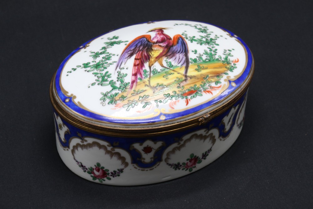 A late 19th century French hand painted porcelain oval box by Samson of Paris View VII