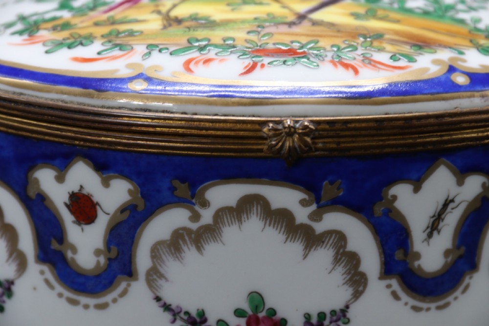 A late 19th century French hand painted porcelain oval box by Samson of Paris View IX
