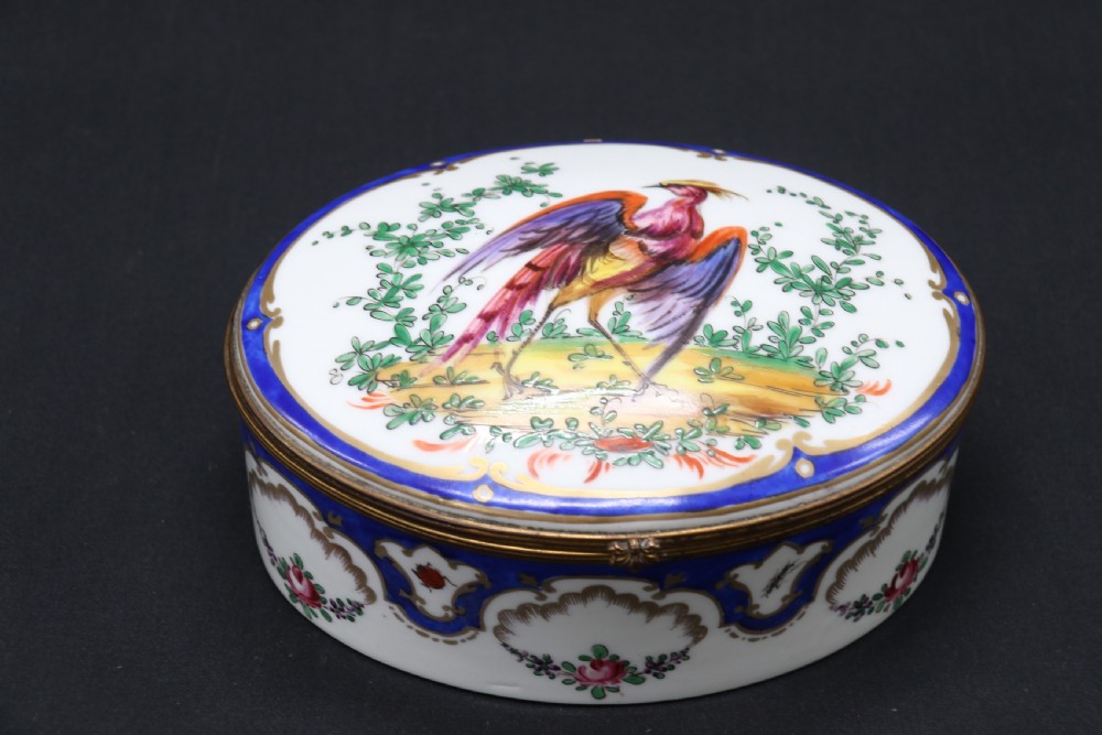 A late 19th century French hand painted porcelain oval box by Samson of Paris View X